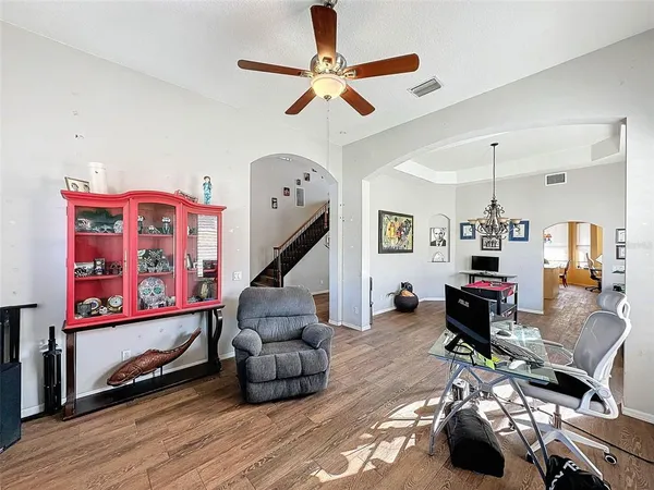 a spacious bathroom with a double vanity sink and a mirror