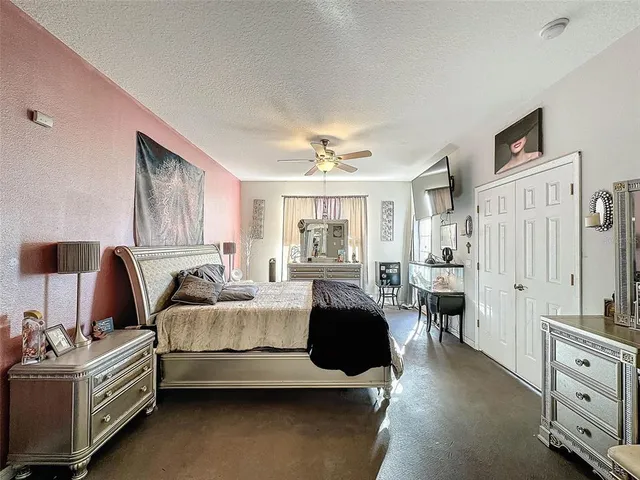 a bed room with furniture and a window