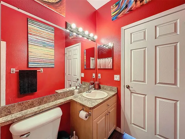 a view of a porch with chairs and backyard