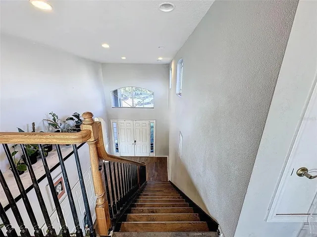a view of swimming pool with outdoor seating and yard