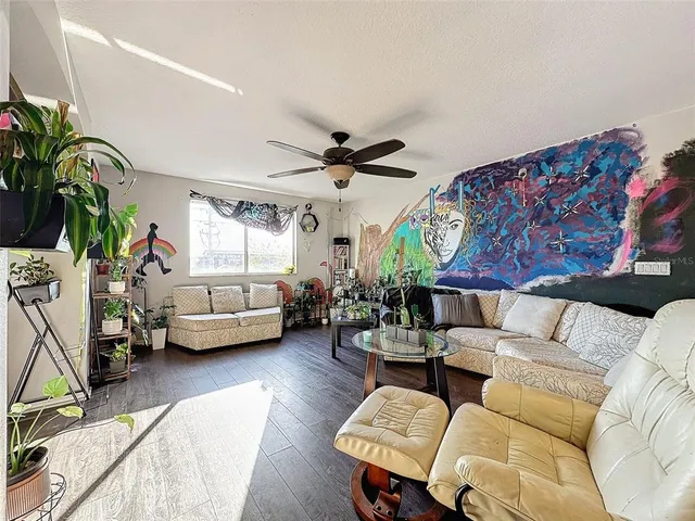an aerial view of a house with a ocean view