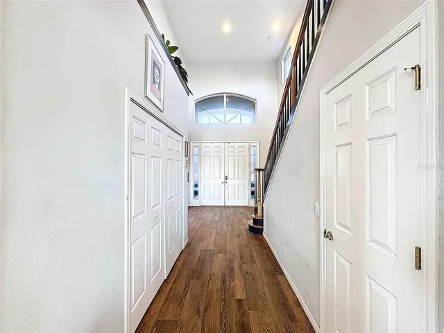 a view of entryway with livingroom and wooden floor