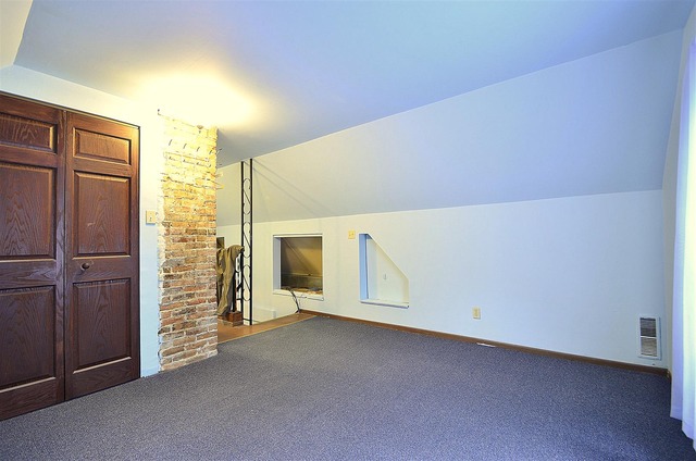 50W338 Ramm Road Maple Park, IL 60151 - Photo 16 of 25 a view of an empty room with brick wall and closet