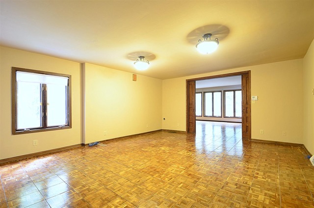 50W338 Ramm Road Maple Park, IL 60151 - Photo 8 of 25 a view of an empty room with window and wooden floor