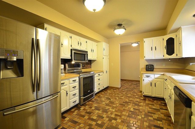 50W338 Ramm Road Maple Park, IL 60151 - Photo 9 of 25 a kitchen with stainless steel appliances granite countertop a refrigerator a stove and a sink