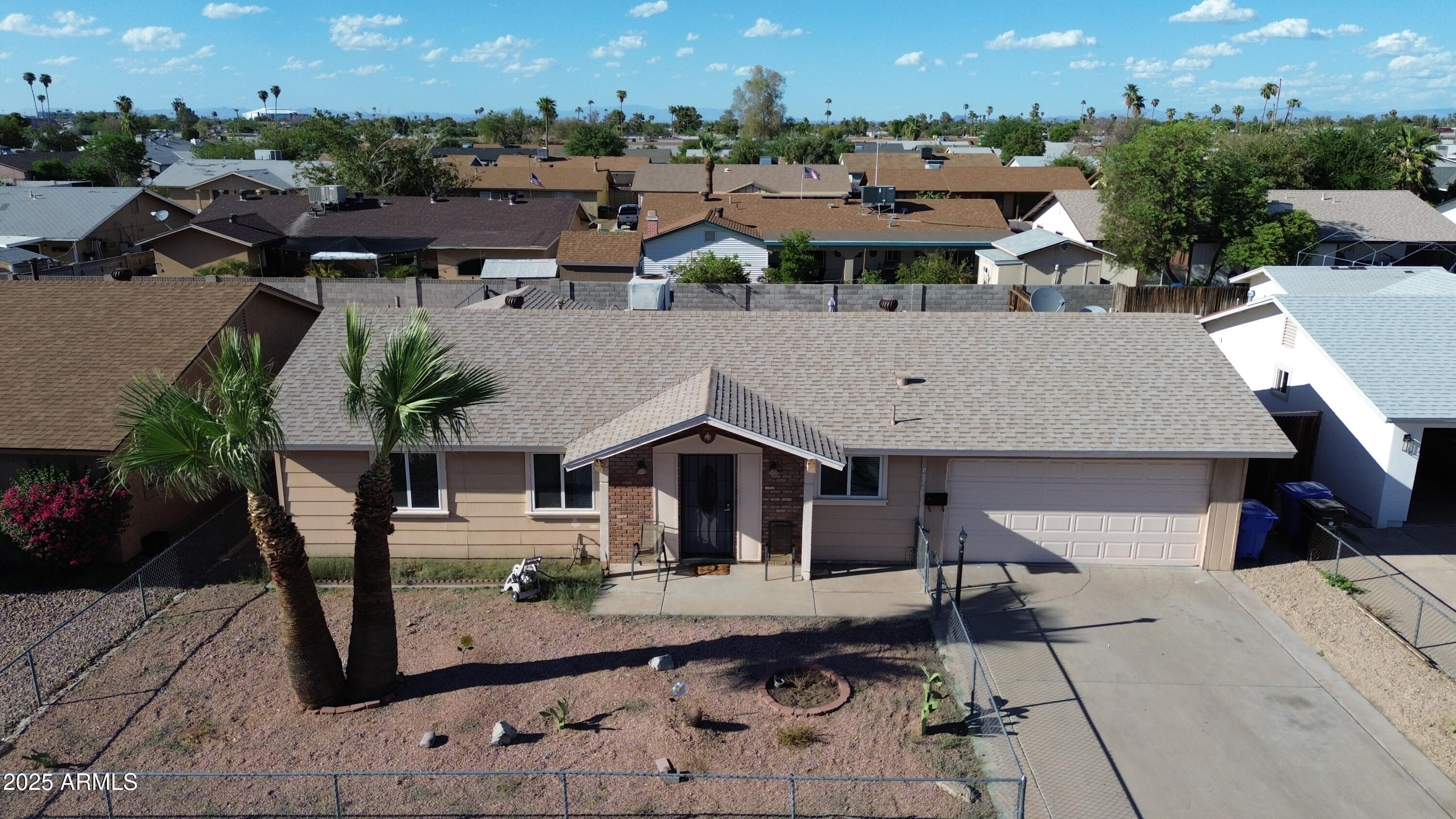 8524 West Weldon Avenue Phoenix, AZ 85037 - Photo 1 of 17 a view of a house with pool porch and sitting area