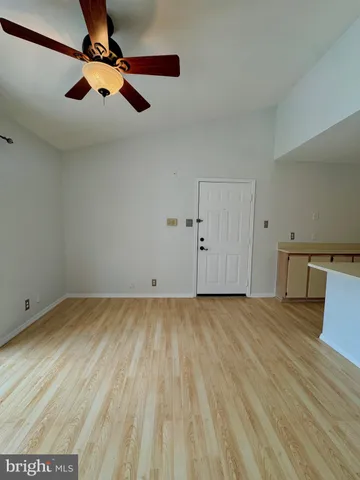 a view of a livingroom with wooden floor