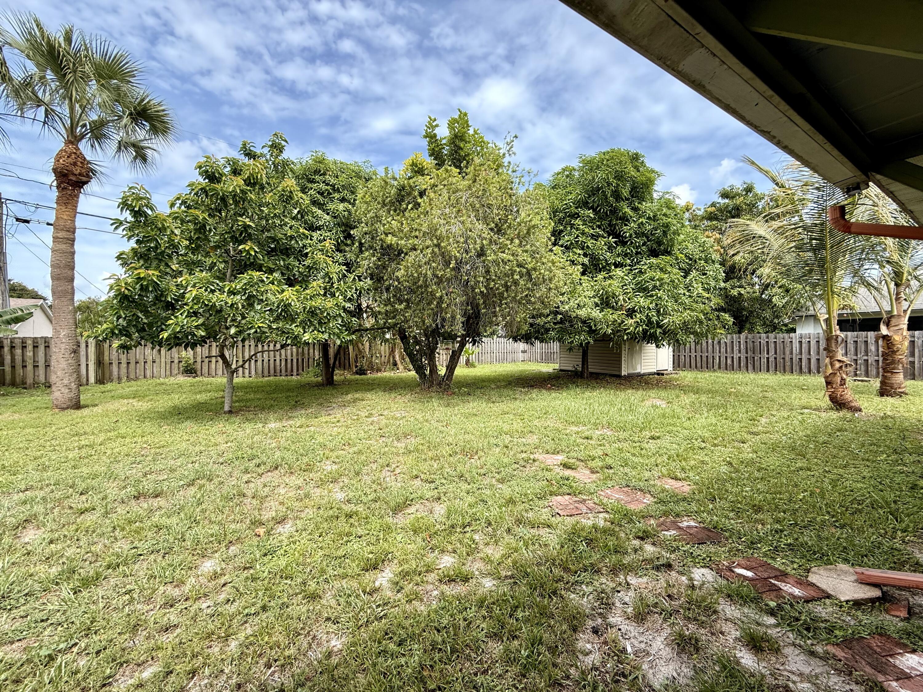 1114 Southwest Del Rio Boulevard Port St. Lucie, FL 34953 - Photo 28 of 31 Back Yard 1