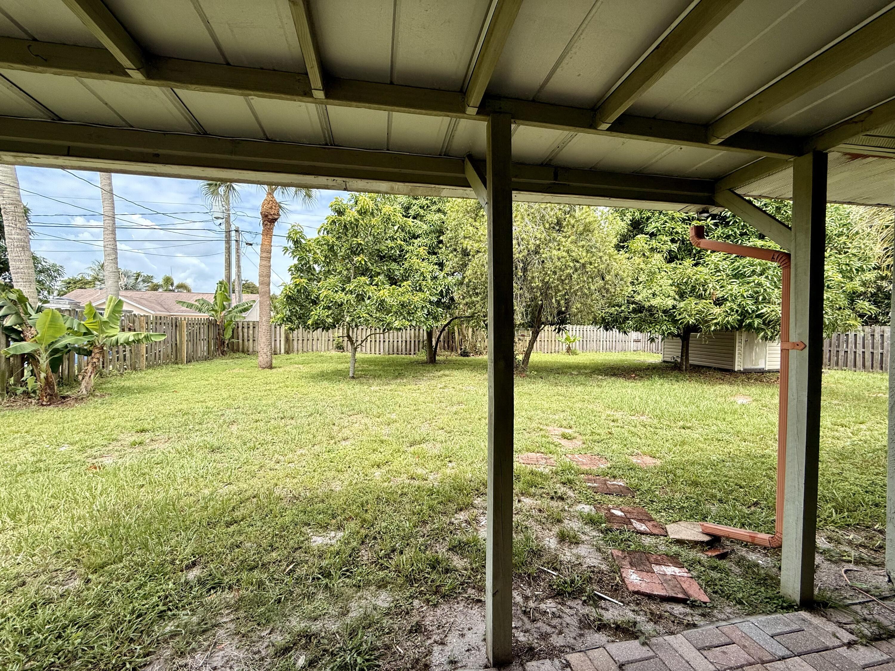 1114 Southwest Del Rio Boulevard Port St. Lucie, FL 34953 - Photo 29 of 31 Backyard 4