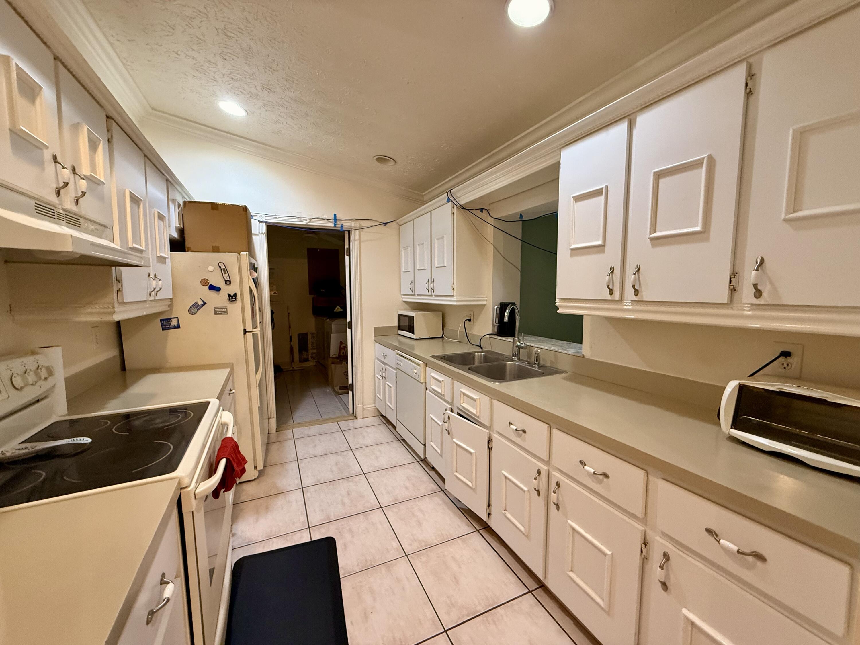 1114 Southwest Del Rio Boulevard Port St. Lucie, FL 34953 - Photo 6 of 31 Kitchen 2