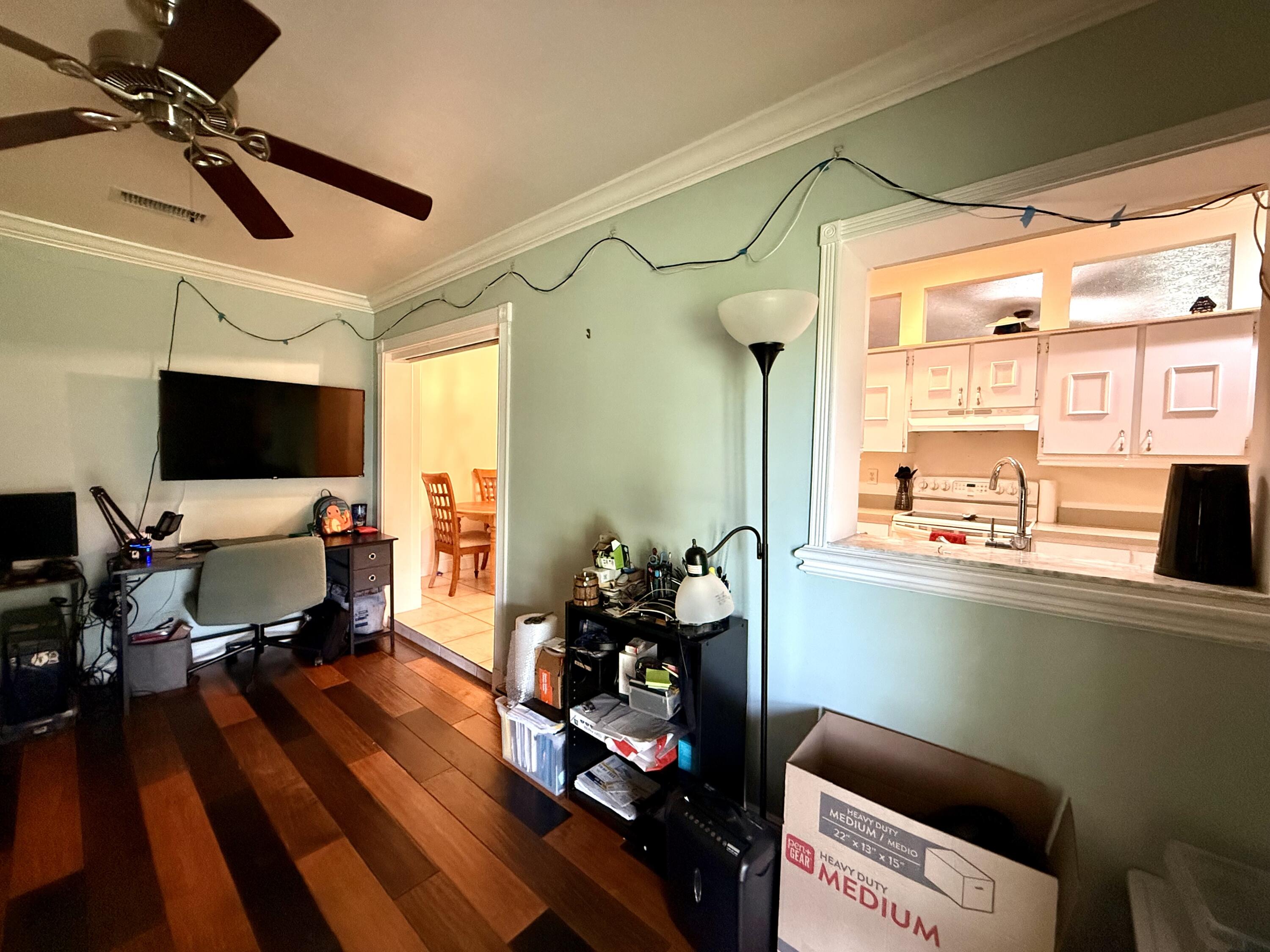 1114 Southwest Del Rio Boulevard Port St. Lucie, FL 34953 - Photo 10 of 31 Back room to Dining:Kitchen