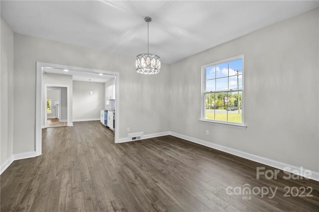 6000 Hickory Grove Road Charlotte, NC 28215 - Photo 25 of 40 a view of livingroom with kitchen and hardwood