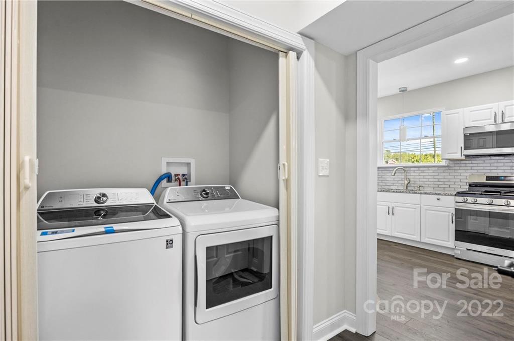 6000 Hickory Grove Road Charlotte, NC 28215 - Photo 31 of 40 a utility room with dryer and washer