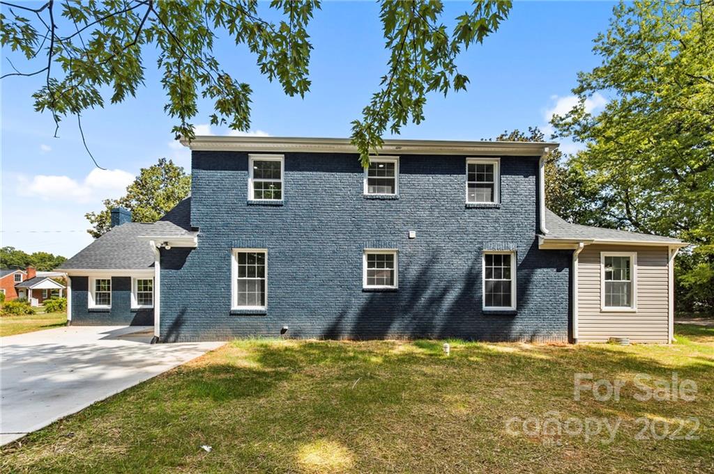 6000 Hickory Grove Road Charlotte, NC 28215 - Photo 10 of 40 front view of a house with a yard