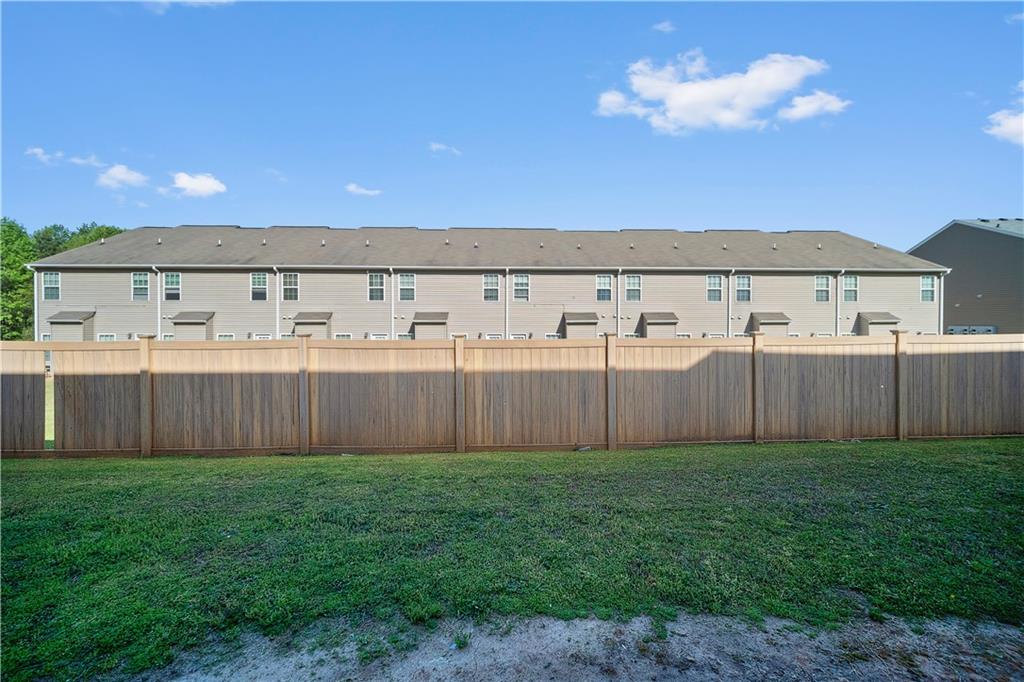 6120 Capitol Knoll Fairburn, GA 30213 - Photo 28 of 28 a view of a house with a backyard