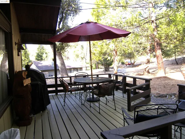 a view of balcony and wooden floor