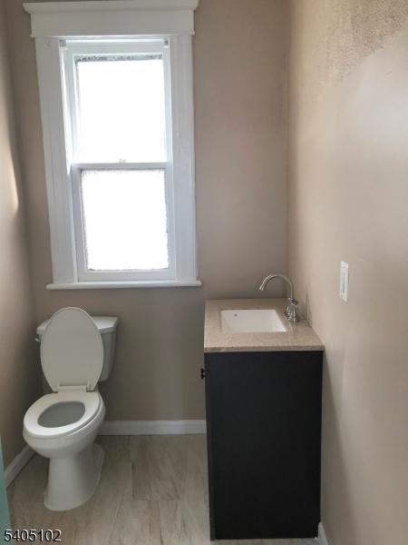 4 Fairview Avenue Somerville, NJ 08876 - Photo 6 of 11 a bathroom with a toilet sink and mirror