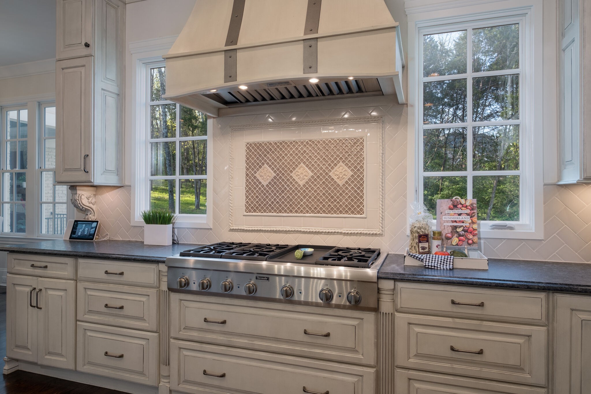 1813 Pace Haven Franklin, TN 37069 - Photo 18 of 49 a kitchen with white cabinets and appliances