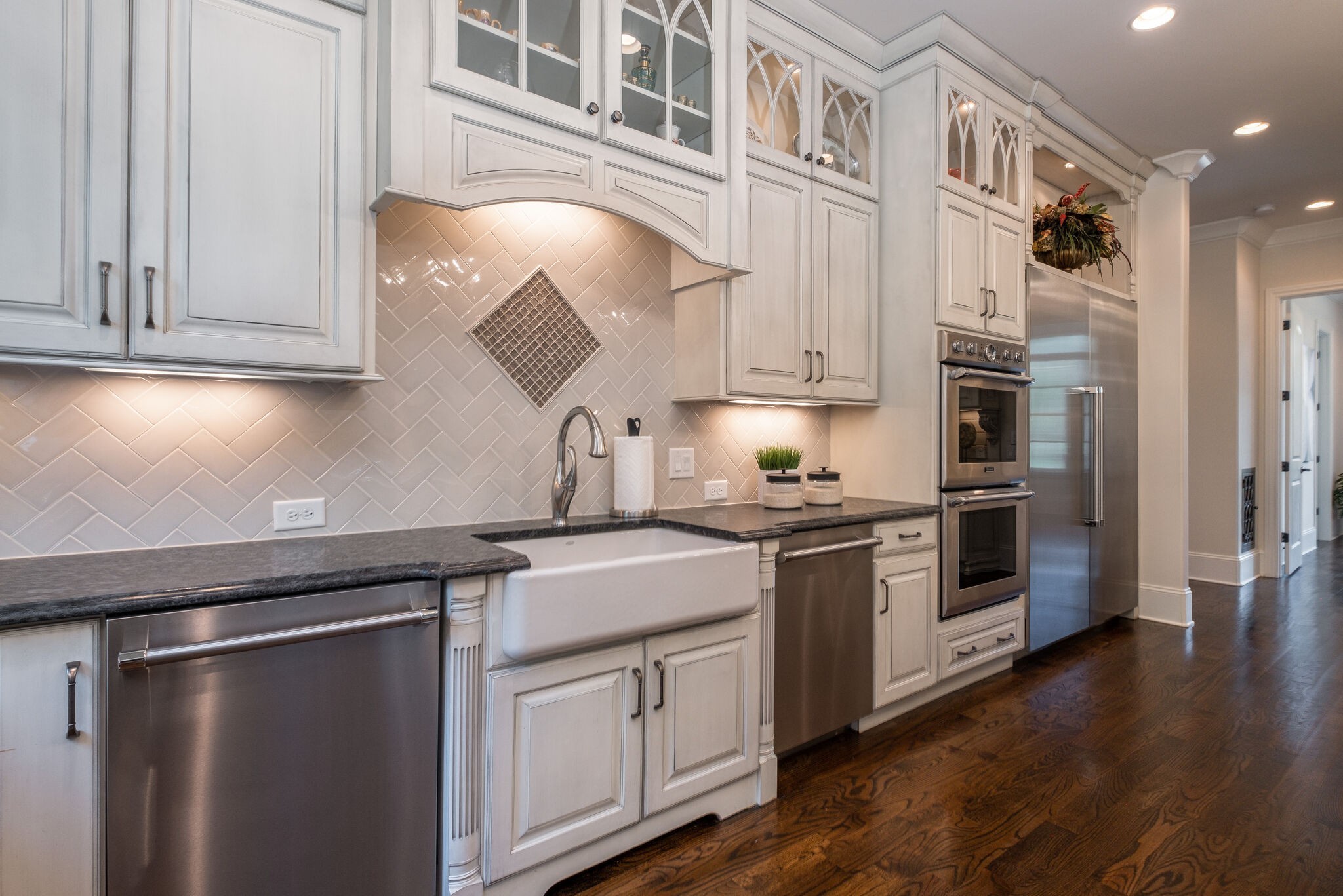 1813 Pace Haven Franklin, TN 37069 - Photo 19 of 49 a kitchen with cabinets and stainless steel appliances