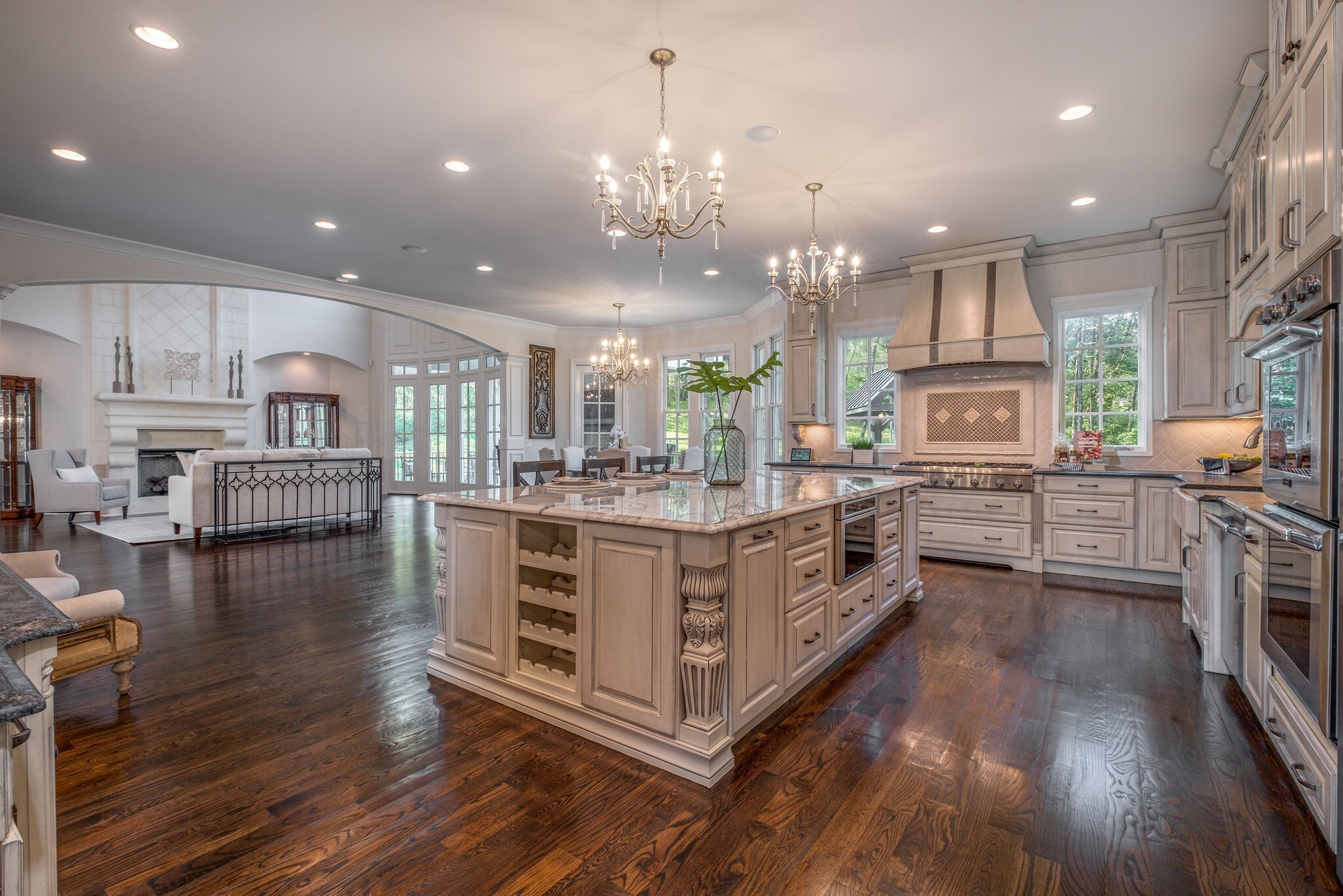 1813 Pace Haven Franklin, TN 37069 - Photo 20 of 49 a kitchen with stainless steel appliances kitchen island wooden cabinets and center island