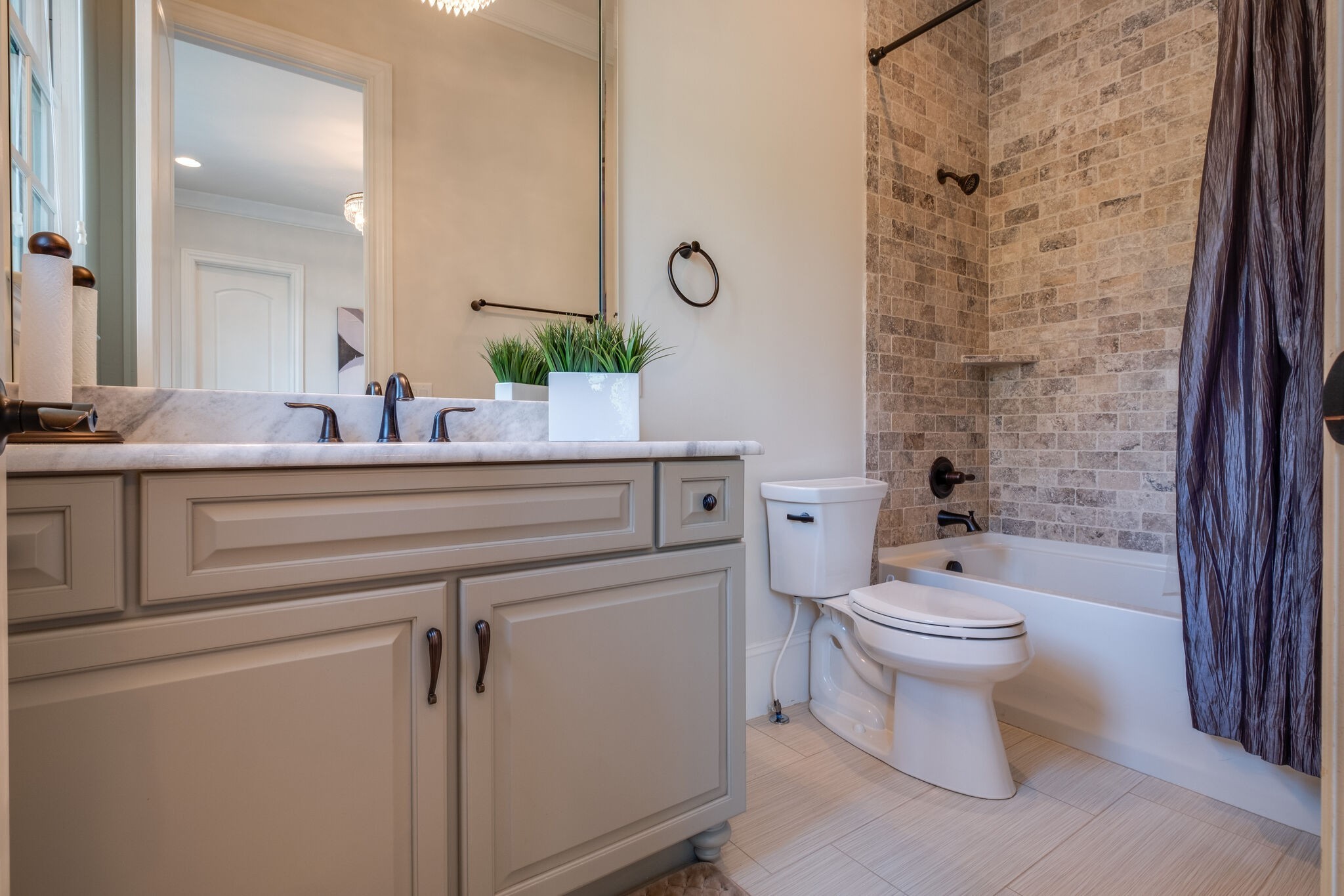1813 Pace Haven Franklin, TN 37069 - Photo 26 of 49 a bathroom with a sink a toilet and a mirror