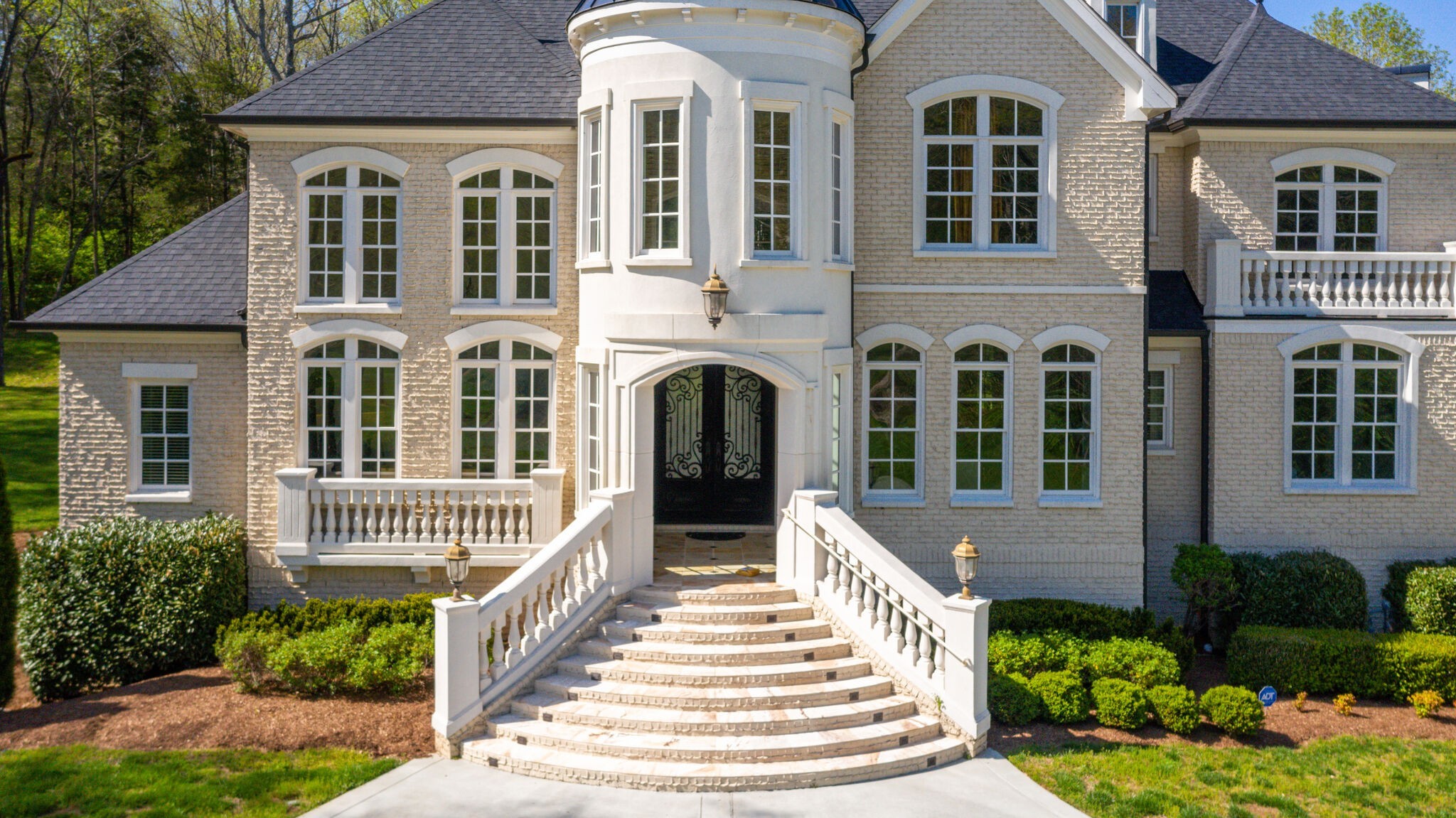 1813 Pace Haven Franklin, TN 37069 - Photo 4 of 49 a front view of a house with a yard