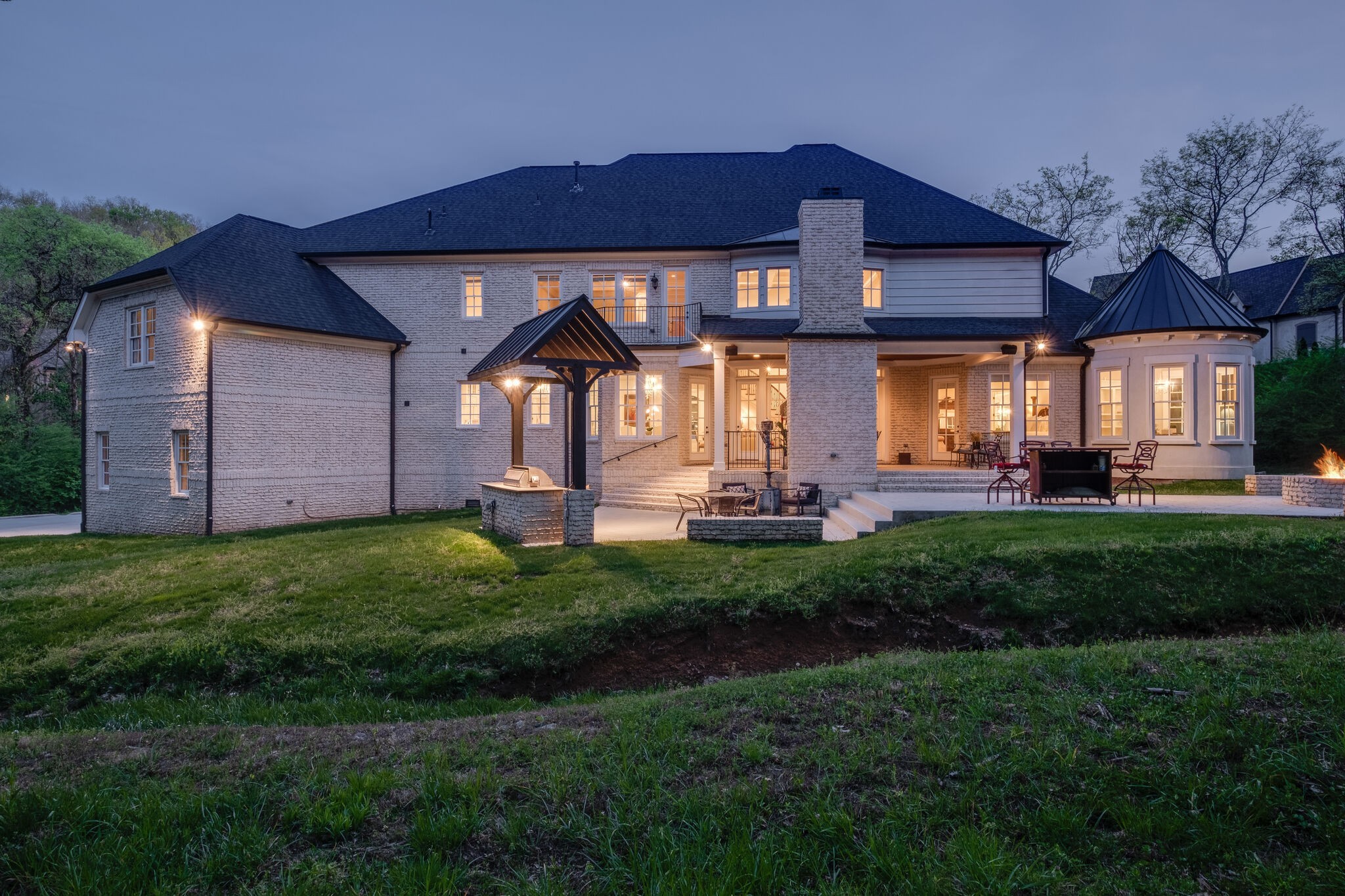 1813 Pace Haven Franklin, TN 37069 - Photo 46 of 49 a front view of a house with a yard table and chairs