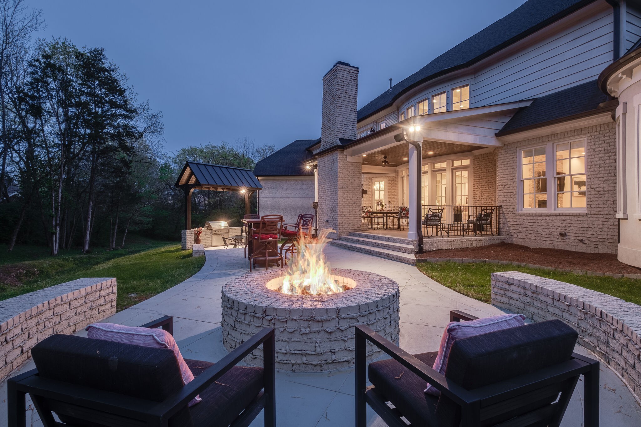 1813 Pace Haven Franklin, TN 37069 - Photo 47 of 49 a view of a patio with couches table and chairs with garden