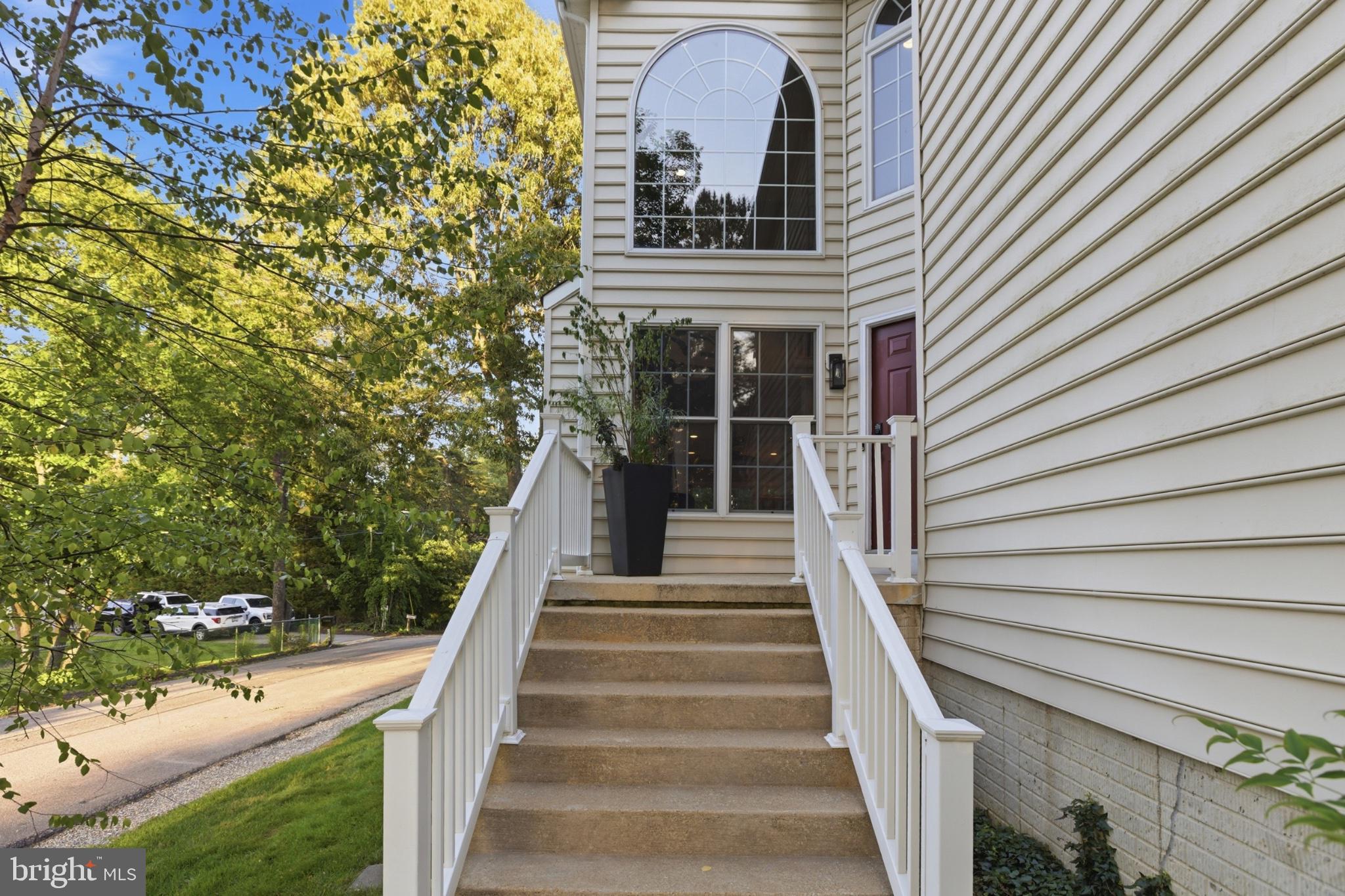 1219 Meadow View Road Pasadena, MD 21122 - Photo 2 of 70 Charming entrance with lush surroundings.