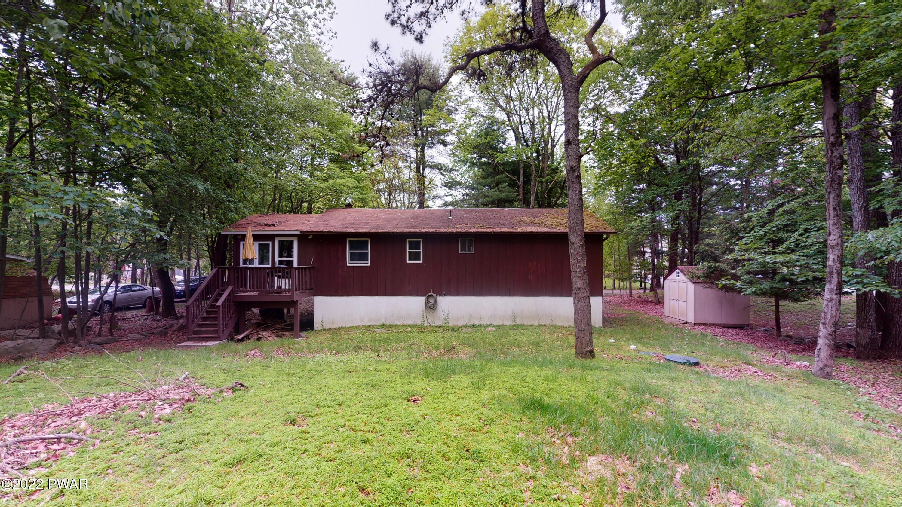 137 Stamford Road Dingmans Ferry, PA 18328 - Photo 17 of 31 front view of a house with a yard