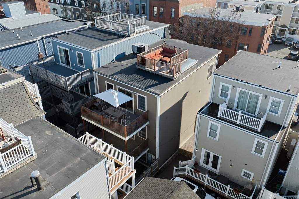 138 West 3rd Street Boston, MA 02127 - Photo 17 of 21 an aerial view of a house with balcony