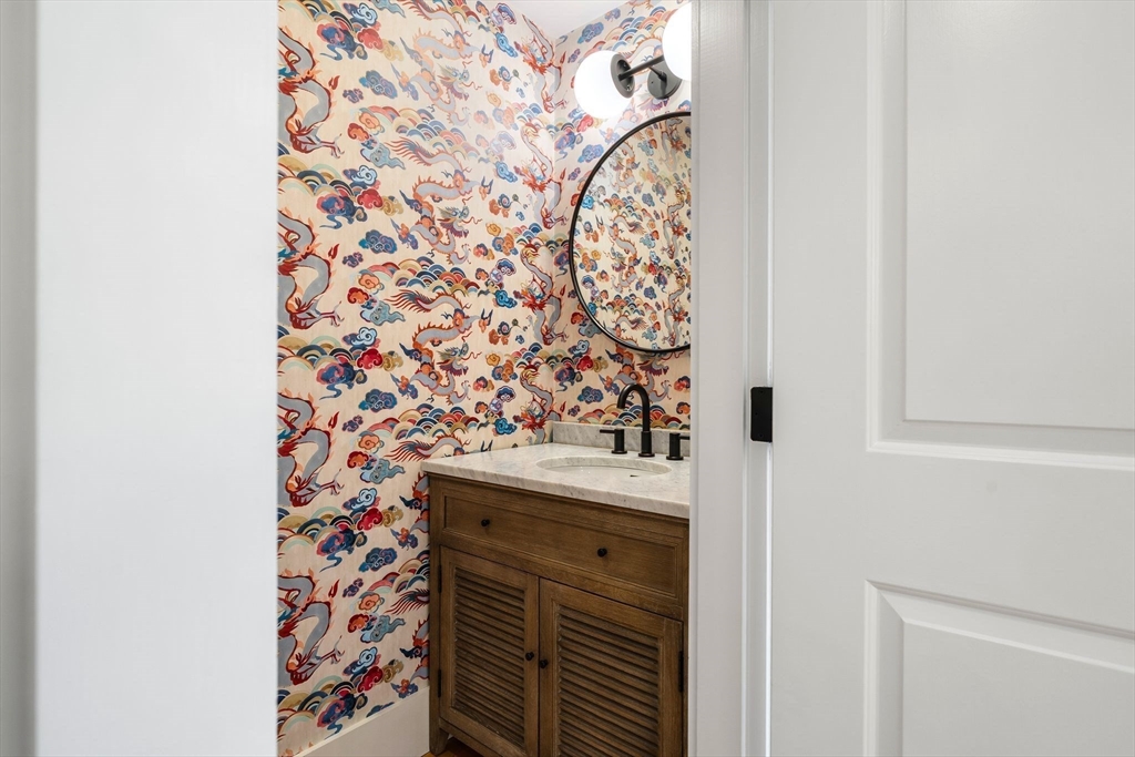 138 West 3rd Street Boston, MA 02127 - Photo 7 of 21 a bathroom with a shower and a sink