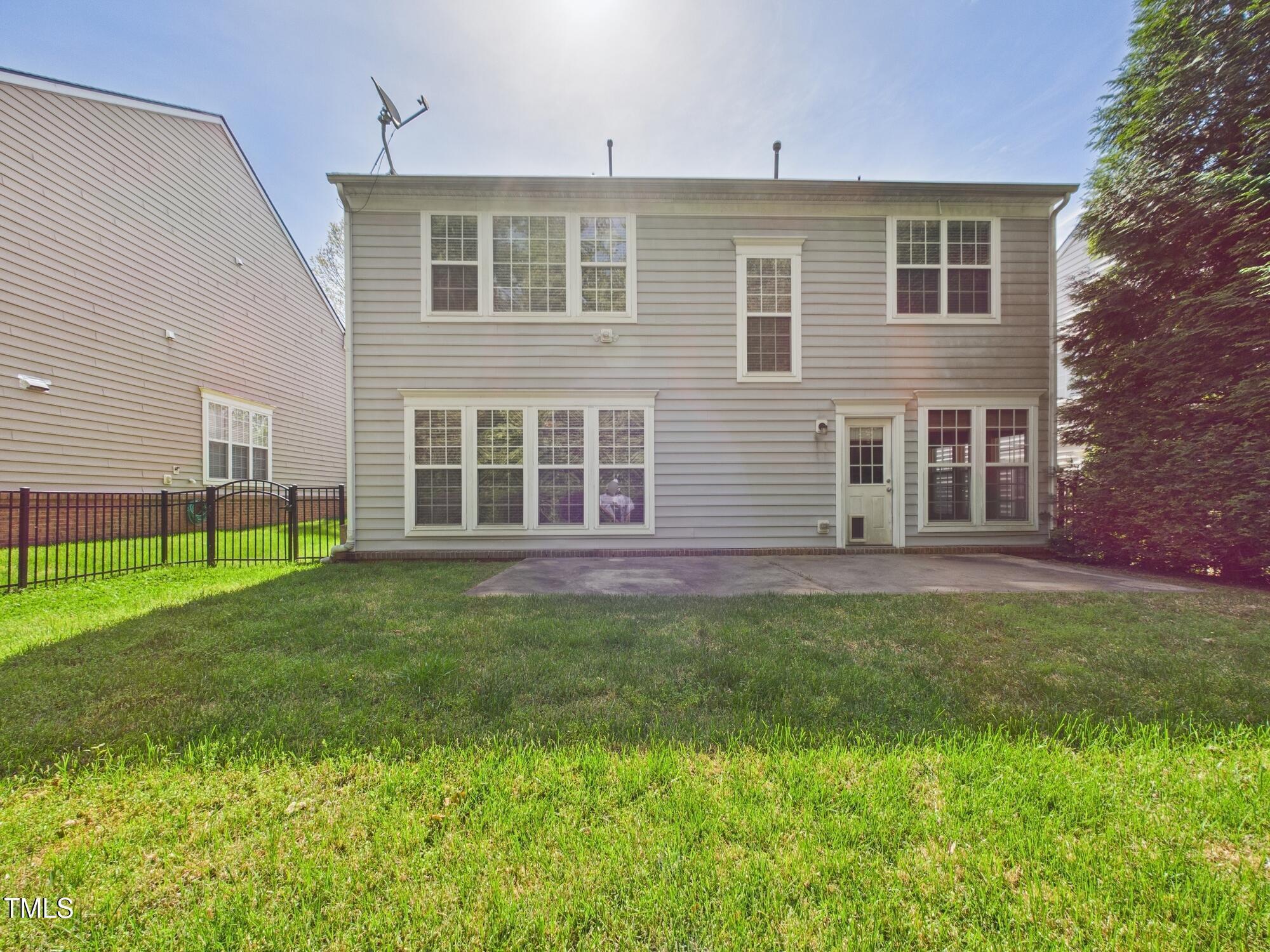 12589 Honeychurch Street Raleigh, NC 27614 - Photo 33 of 100 a front view of a house with a garden
