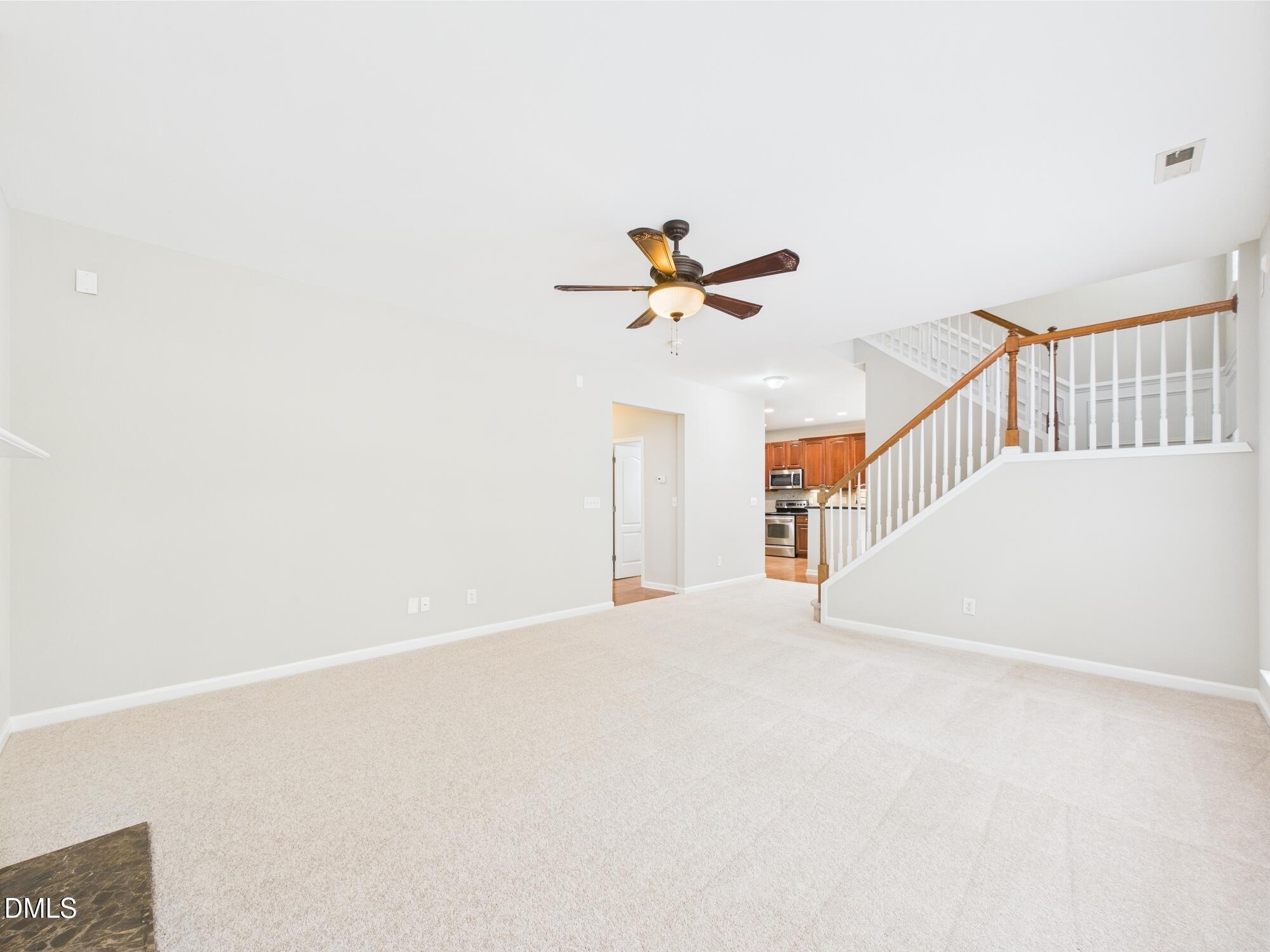 12589 Honeychurch Street Raleigh, NC 27614 - Photo 83 of 100 a view of an empty room with a window