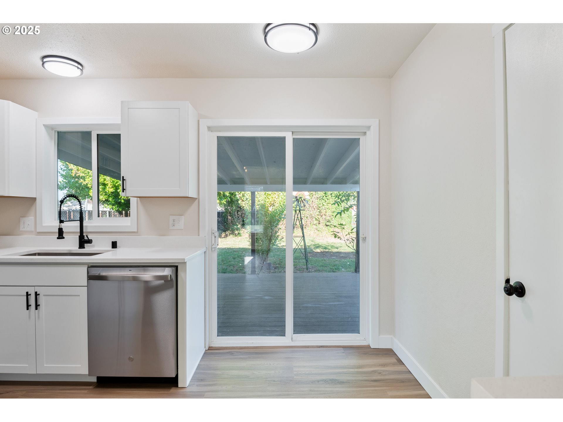 435 28th Avenue Longview, WA 98632 - Photo 11 of 24 a kitchen with a sink and cabinets