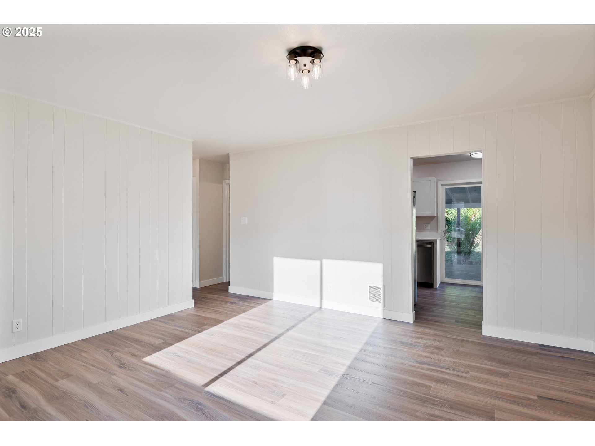 435 28th Avenue Longview, WA 98632 - Photo 7 of 24 a view of an empty room with wooden floor