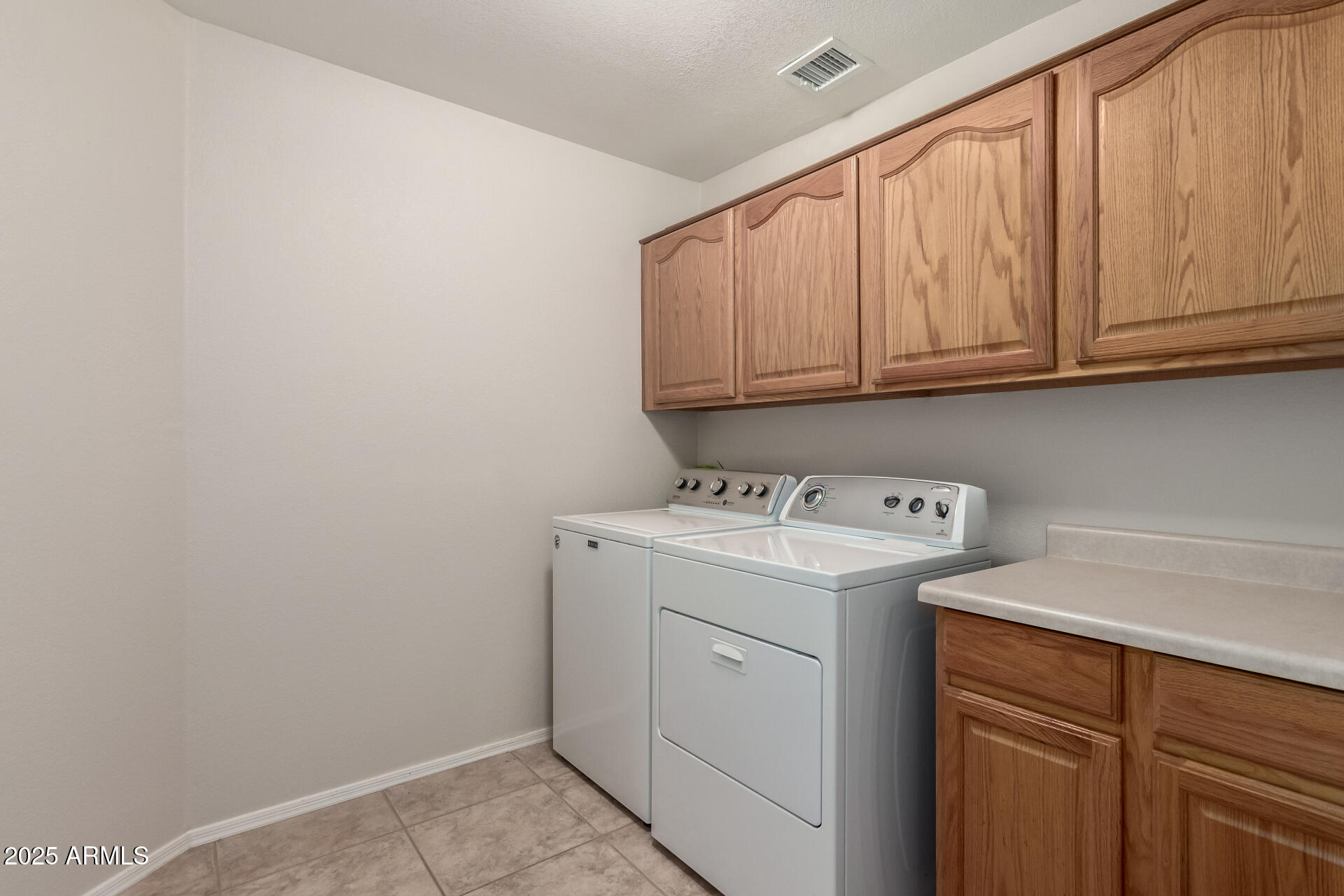 1182 East Harrison Street Gilbert, AZ 85295 - Photo 19 of 23 a utility room with dryer and washer
