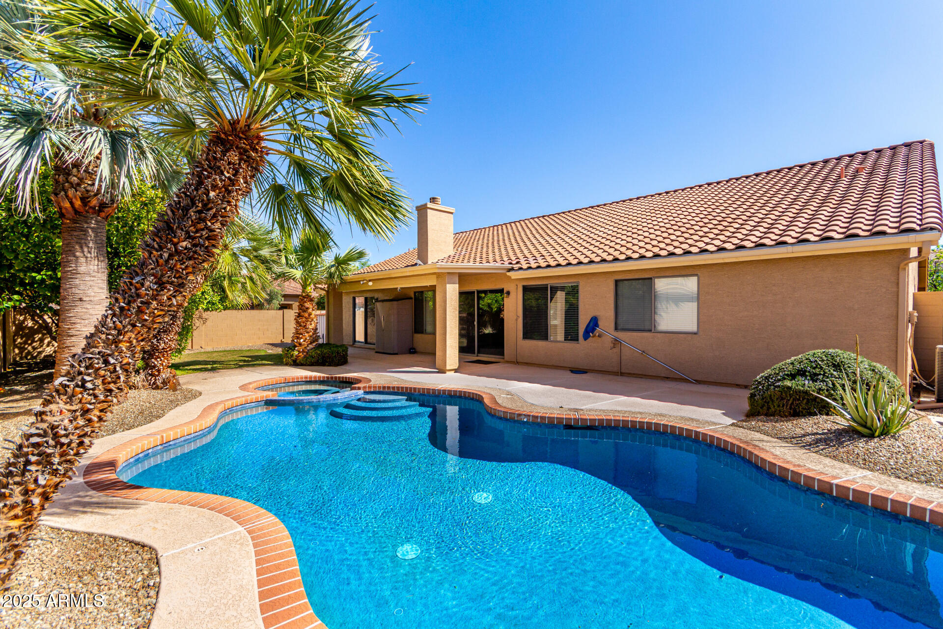 1182 East Harrison Street Gilbert, AZ 85295 - Photo 21 of 21 a front view of house with yard and swimming pool