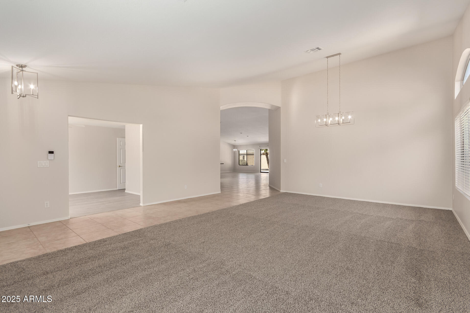 1182 East Harrison Street Gilbert, AZ 85295 - Photo 5 of 21 a view of empty room with wooden floor