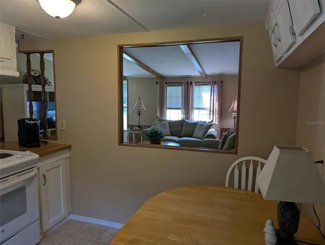 a bedroom with a bed and dresser