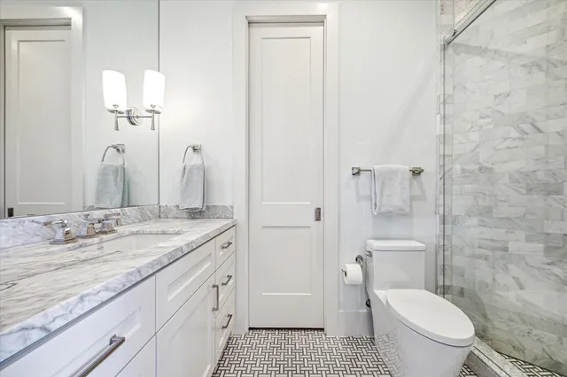 a utility room with sink dryer and washer