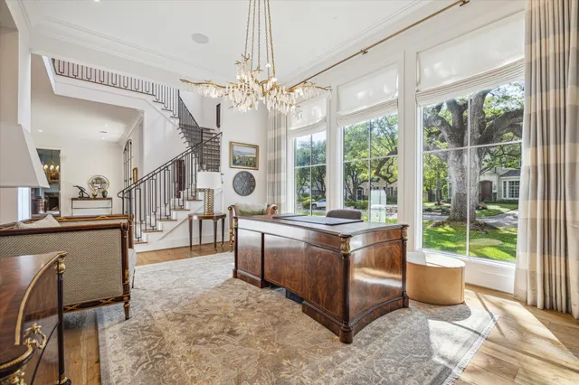 a open kitchen with stainless steel appliances granite countertop a stove and a refrigerator