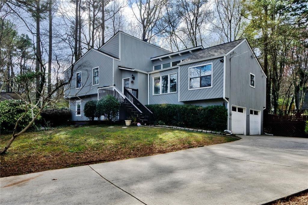 3947 Viewpoint Court Marietta, GA 30066 - Photo 1 of 1 a front view of a house with a yard