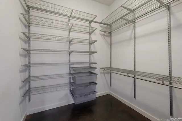 a empty closet with white paint