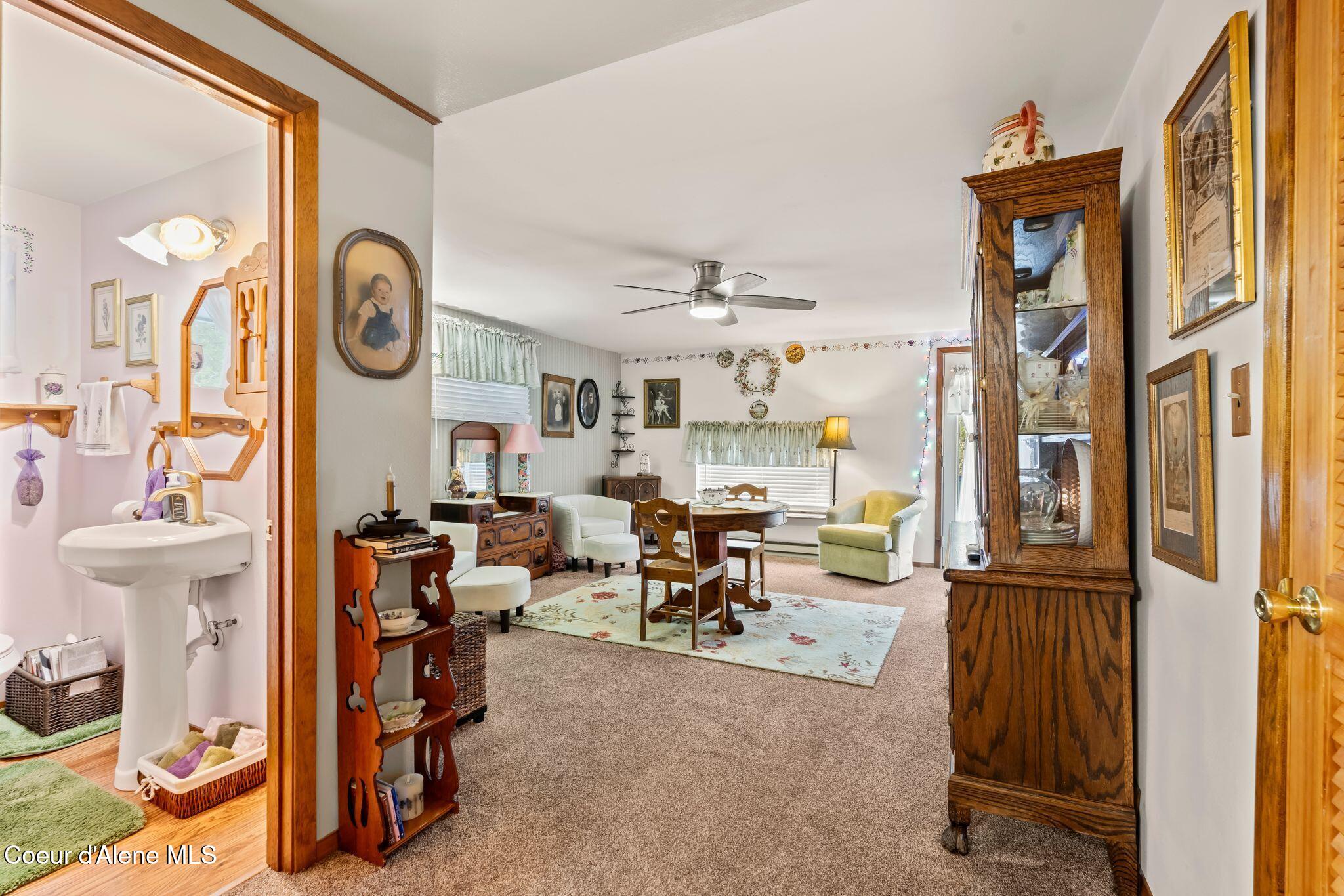 780 Selkirk Road Sandpoint, ID 83864 - Photo 22 of 57 2nd level sitting/dining with balcony