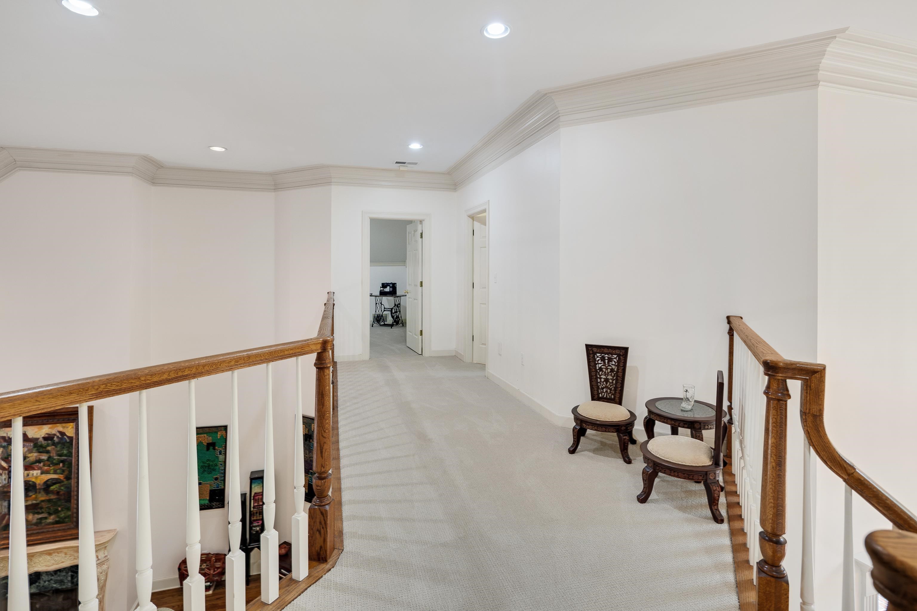 350 Bluff Ridge Cove Memphis, TN 38018 - Photo 30 of 37 Upper-level hallway featuring light-toned carpet flooring, recessed lighting, and crown molding