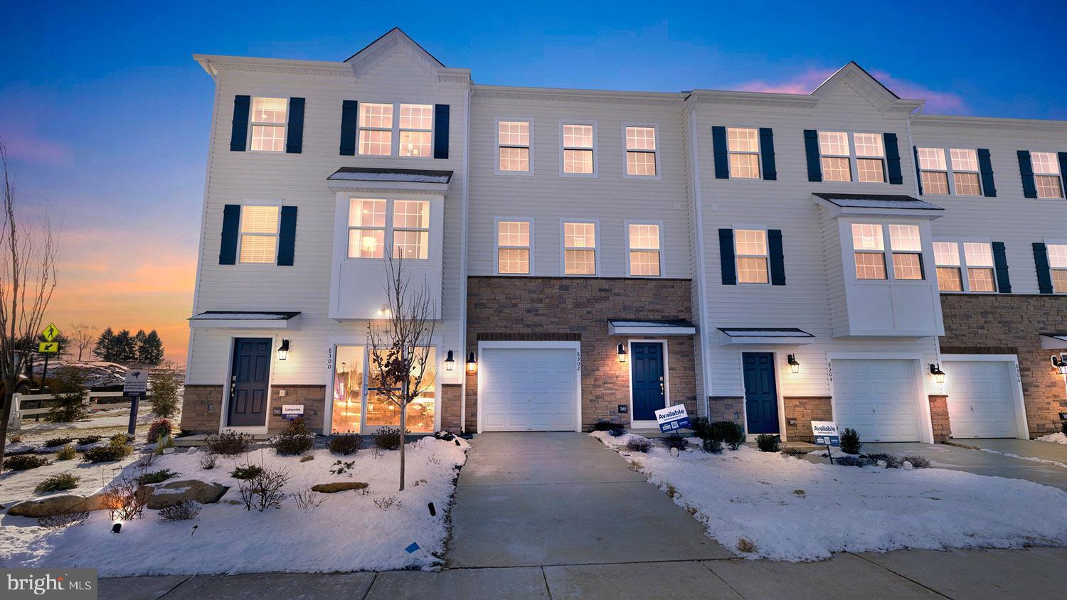 8303 Alexander Court Breinigsville, PA 18031 - Photo 1 of 25 a front view of a building with many windows