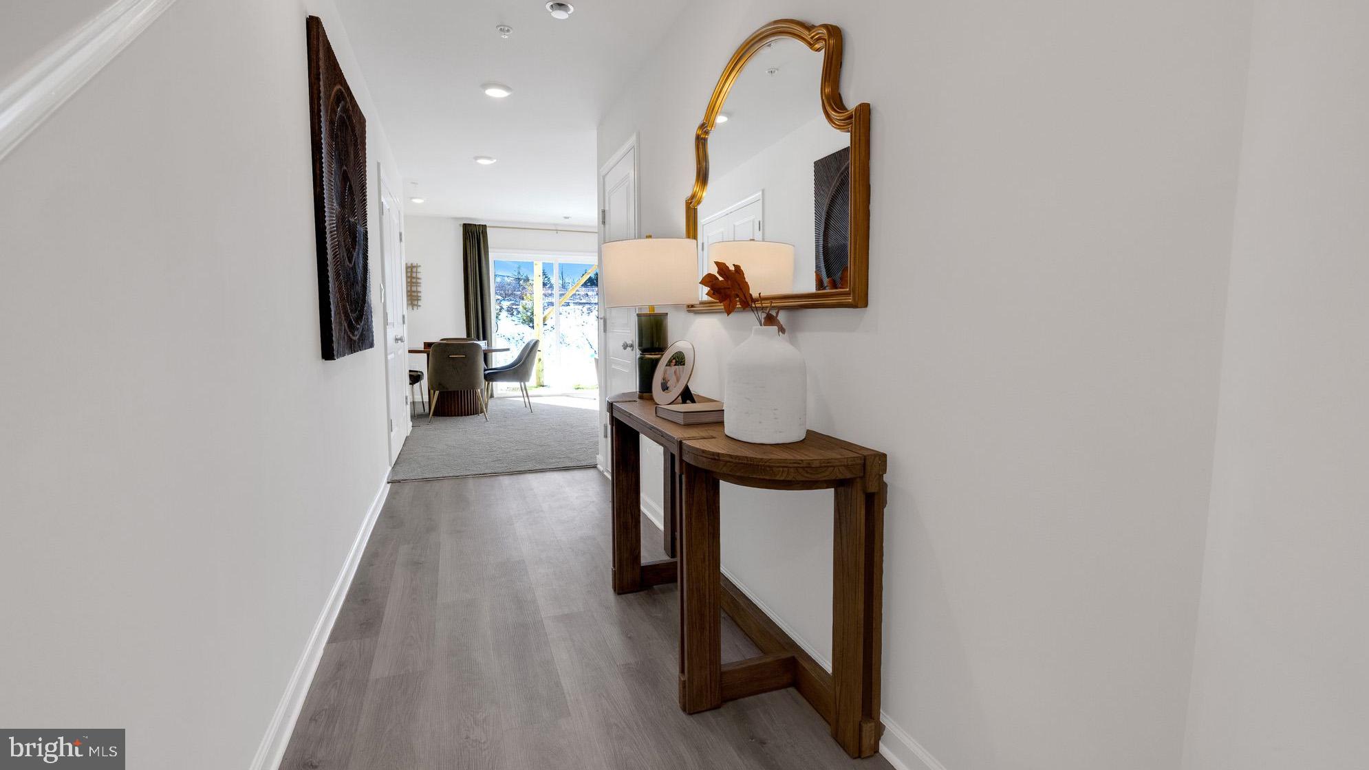 8303 Alexander Court Breinigsville, PA 18031 - Photo 4 of 25 a view of entryway and hall with wooden floor