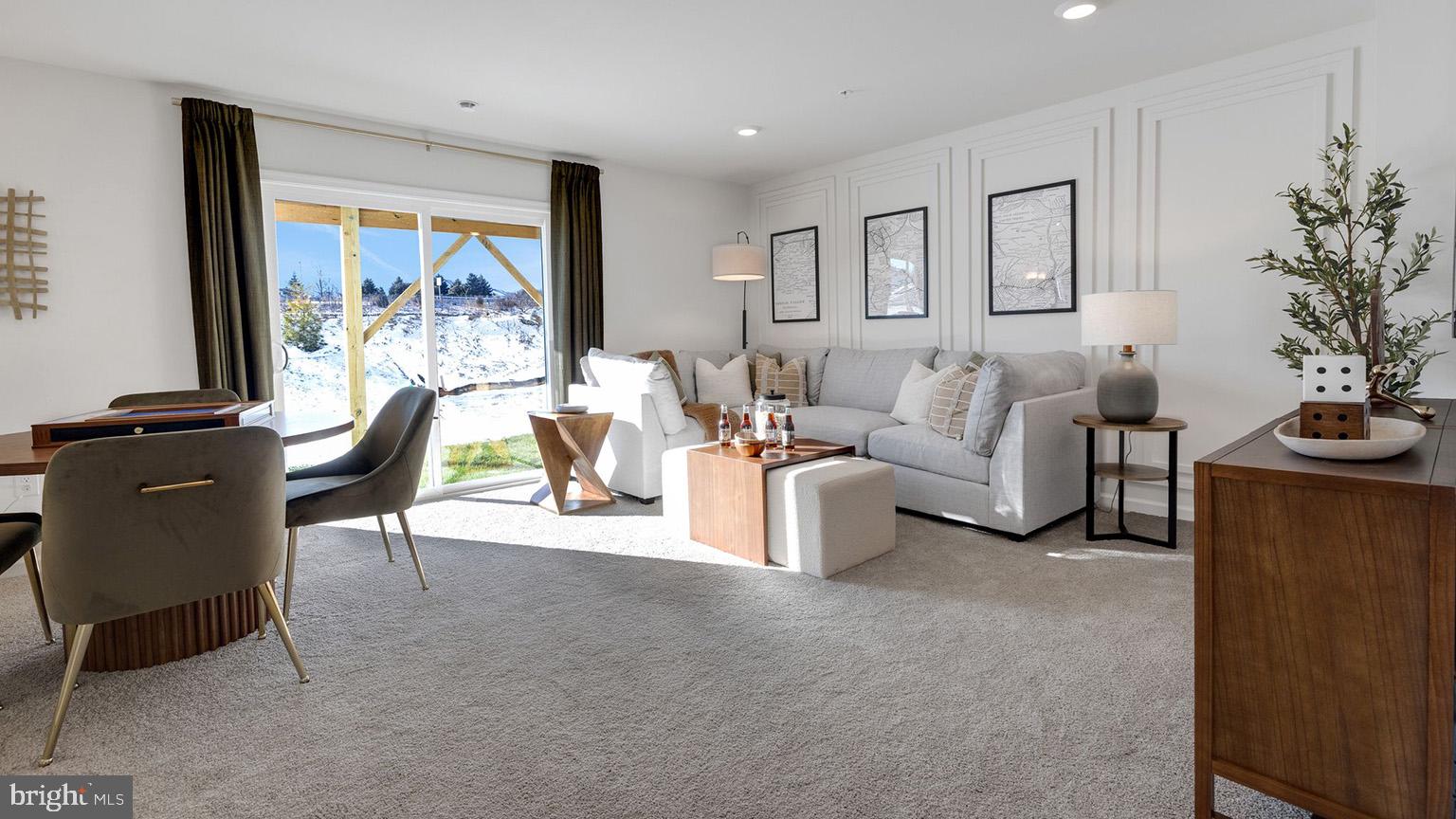 8303 Alexander Court Breinigsville, PA 18031 - Photo 5 of 25 a living room with furniture and a flat screen tv