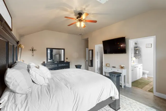 a bathroom with a sink double vanity and a mirror